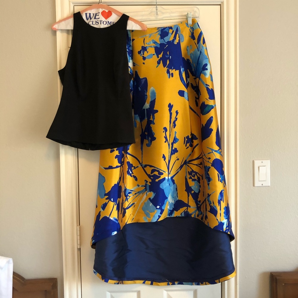 A two piece top and skirt dress set